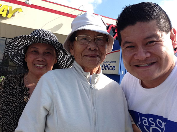 Jason Luong with two people
